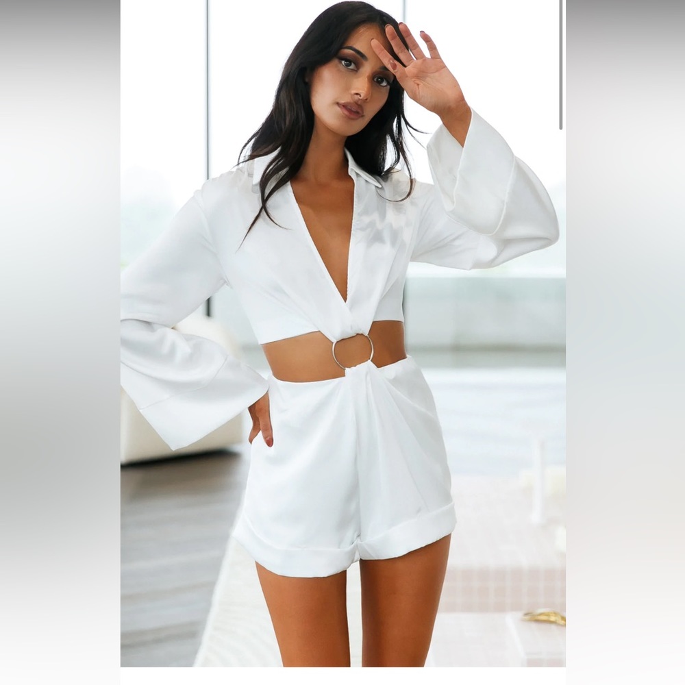 White romper, satin size medium.